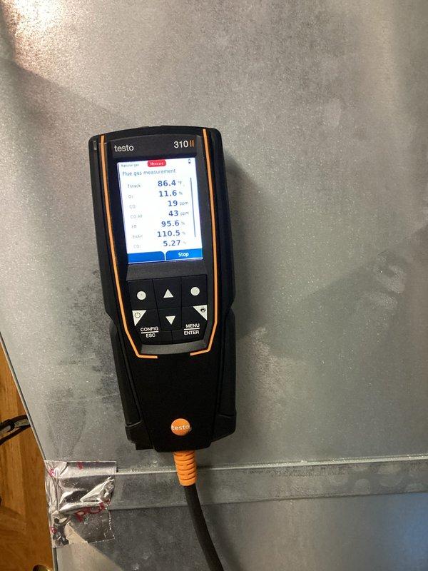 Performed comprehensive tune-up on high efficiency Trane furnace including combustion analysis using Testo analyzer, which confirmed safe operation parameters. Inspected electrical connections and verified they remain solid. Replaced humidifier panel, cleaned flame sensor, and verified adequate filter condition. System is functioning properly and ready for continued operation.