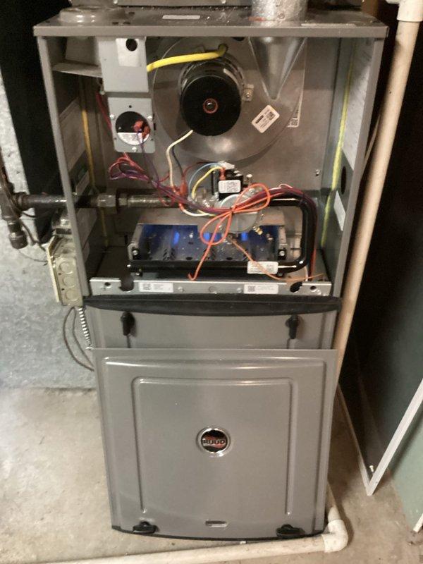 Performed a routine tune-up on a 3-year-old Ruud forced air furnace system. Verified system is operating with safe combustion parameters as confirmed by Testo 310 analyzer readings. Completed preventative maintenance including cleaning flame sensor and inspecting all electrical connections, finding the system in good working condition with no issues detected.