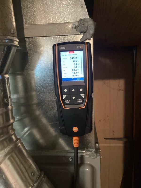 Performed a routine tune-up on a 3-year-old Ruud forced air furnace system. Verified system is operating with safe combustion parameters as confirmed by Testo 310 analyzer readings. Completed preventative maintenance including cleaning flame sensor and inspecting all electrical connections, finding the system in good working condition with no issues detected.