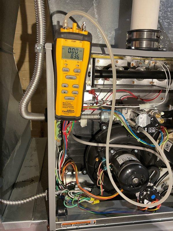 Performed scheduled furnace tune-up and inspection on 2-year-old HFR system. Diagnostic testing included pressure readings (0.89/8.36) on internal components. Identified plumbing issues with leaking hose bib and galvanized pipe; arranged for plumber to provide separate quote for these repairs.