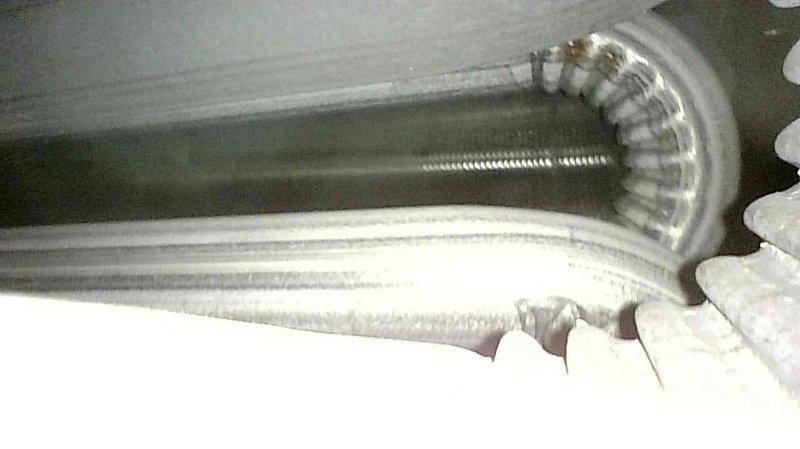 Performed routine furnace tune-up on 15-year-old FRP system, including flame sensor cleaning, burner maintenance, and heat exchanger inspection. Critical finding: discovered multiple holes in the heat exchanger, presenting a significant safety concern. Tagged out and shut down the furnace per safety protocols, informed homeowner of findings and recommended immediate replacement. Customer has requested a sales advisor visit to discuss replacement options.