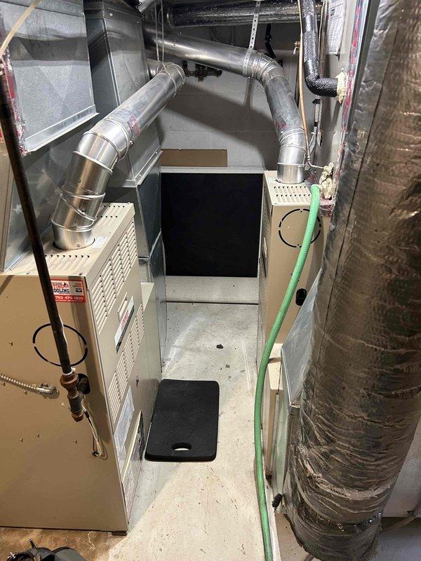 Performed comprehensive tune-up service on three residential furnaces. Inspected all major components, cleaned flame sensors, verified proper gas pressure, conducted gas leak testing, and confirmed carbon monoxide levels were within safe parameters. Replaced HVAC filters and thermostat batteries, and inspected electrical connections. Noted cosmetic surface rust and water streaking on some equipment, but all units were functioning normally with no active water leaks or operational issues requiring immediate repair.