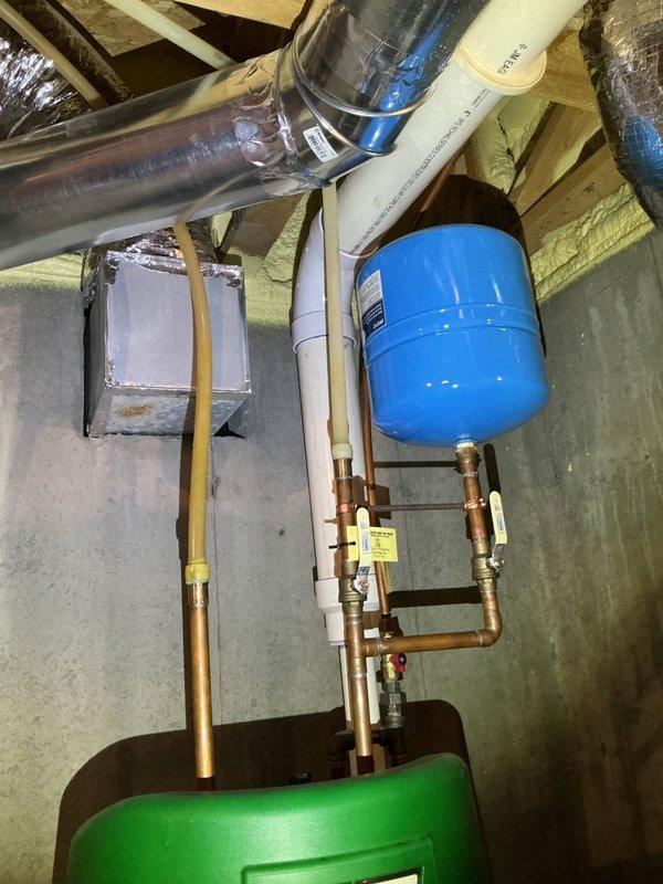 Diagnosed and replaced faulty ignitor on 12-year-old AO Smith natural gas water heater. Restored hot water functionality for both domestic use and in-floor heating system. Unit now operating within normal parameters.