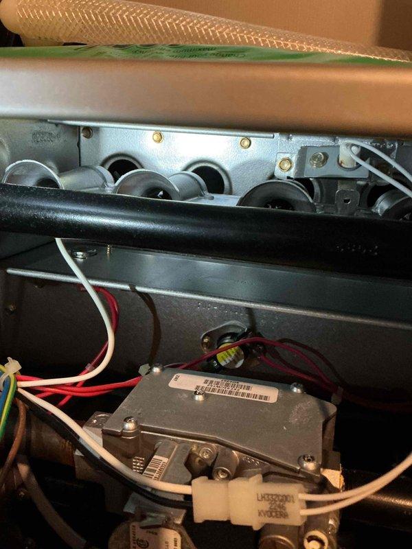 Performed comprehensive tune-up on 3-year-old Carrier furnace, verifying all components are functioning properly, including flame sensor, igniter, blower assembly, draft motor, burners, and control board. Combustion analysis confirmed safe operation. Identified issue with stripped screw hole on heat exchanger backplate causing condensation pooling in upper furnace compartment. Will provide estimate for backplate replacement or complete heat exchanger replacement as necessary.