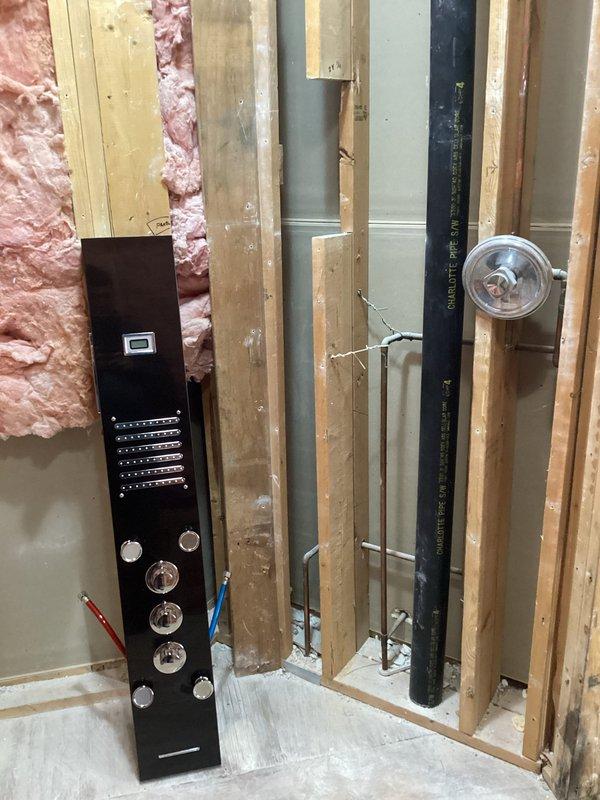 Conducted site assessment for bathroom remodel project involving leaking ball valves. Inspected exposed wall framing, existing plumbing lines, and pressure control system that will require relocation during renovation. Identified shower head repositioning requirements and documented current infrastructure for upcoming service work.