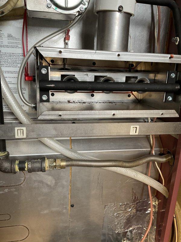 Completed annual maintenance agreement service on 1-year-old Heil furnace (HFR model). Performed comprehensive 12-point furnace tune-up inspection with no operational issues detected. System components inspected include burner assembly, gas connections, condensate drain line, and ventilation. Outdoor Lennox condensing unit also visually inspected for condition.