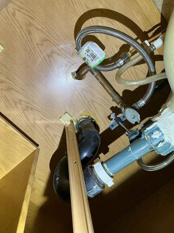 Successfully removed toilet and vanity cabinet in preparation for scheduled flooring replacement. Disconnected all plumbing connections including water supply lines and drain pipes. Customer to be contacted for reinstallation appointment after new flooring is completed.
