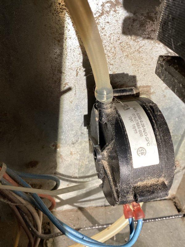 Responded to a no-heat call for a 20+ year old LP furnace. Diagnosed issue with pressure switch not closing properly. After adjusting and cleaning connections to pressure switch and associated tubing, system began functioning correctly. Performed visual inspection of heat exchanger with no defects noted. Provided customer with estimate for replacement pressure switch as preventative measure.