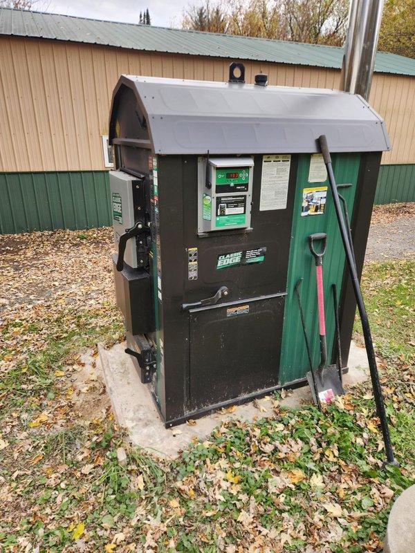 Responded to no-heat call for aging outdoor wood stove system. Diagnosed and replaced failed circulator pump that was preventing water circulation. Also identified faulty water level sensor, installed new sensor and verified proper operation. System is now functioning properly with restored water circulation and accurate level monitoring.