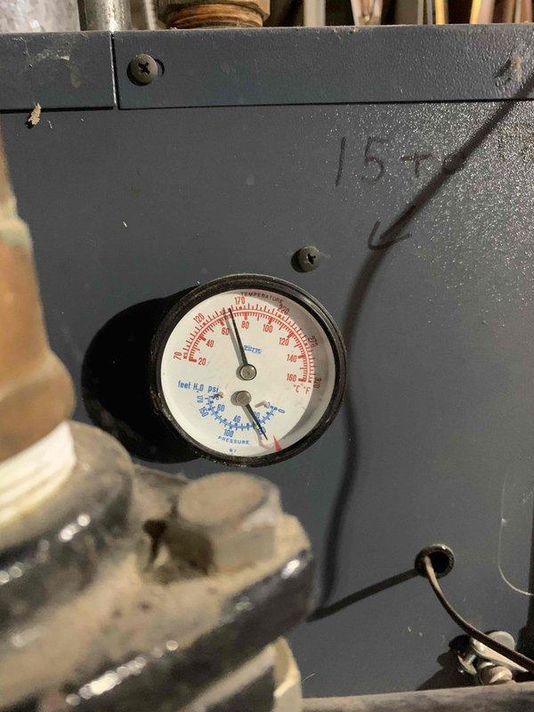 Performed first phase of two-part boiler system flush treatment, adding Fernox F3 cleaner and cycling the system to begin the cleaning process. Verified system pressure readings and documented current condition of pressure gauge. Scheduled follow-up visit to complete second phase of treatment in approximately two weeks.