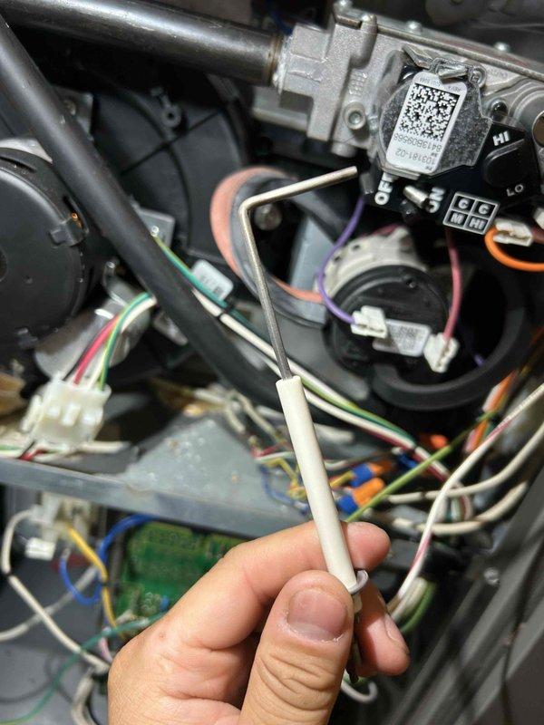 Performed comprehensive furnace tune-up on 12-year-old gas unit. Removed rust and debris from inducer motor housing, verified proper gas manifold pressures on both stages, confirmed safe CO readings, and validated normal thermostat/blower operation. Cleaned condensate trap and drain line, inspected heat exchanger surfaces, and confirmed all components functioning properly. System operating normally with no issues detected. Provided information on rewards program and recommended stocking additional filters.