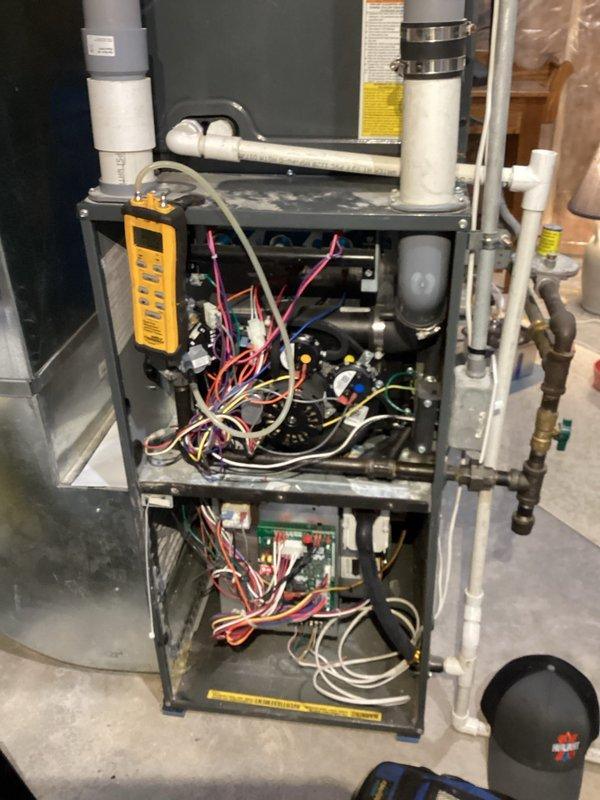 Serviced 2-year-old Amana furnace with ignition failure. Performed maintenance including cleaning flame sensor, burners, and condensate system. Restored proper ignition and verified operation; furnace now functioning correctly.