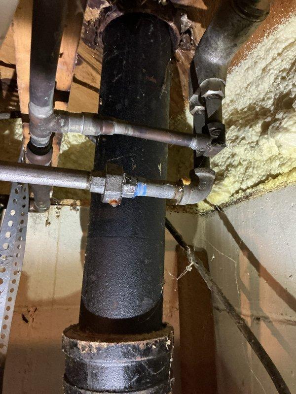 Replaced failed factory-supplied threaded drain adapter on water treatment system that was causing a leak. Service required 1 hour to complete installation of new adapter, resolving the issue and restoring proper function to the system.