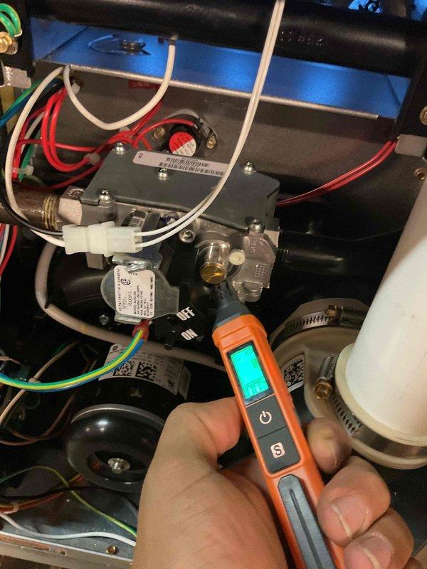 Performed annual inspection on two commercial furnace units. Diagnostic testing with multimeter confirmed proper electrical functionality of control module and gas valve. Noted accumulated dirt on internal components and filter. Replaced dirty air filter on one unit to restore proper airflow. Visual inspection of all wiring connections, valve assembly, and mounting components showed no issues requiring further service.