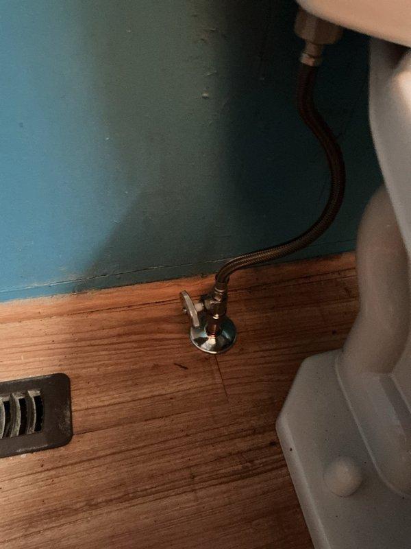 Responded to recurring toilet drainage issue at Unit 12-4. Diagnosed slow tank refill (approximately 20 minutes) causing toilet clog. Replaced defective angle stop valve, restoring proper water flow and resolving drainage problem. Inspected supply line and connections for proper function after repair.