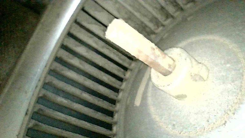 Diagnosed and repaired 15-year-old furnace with no heat due to a weak pilot flame causing flame sensing failure. Removed pilot assembly, cleared obstruction in gas tubing, and reinstalled components, successfully restoring proper ignition and operation. Noted significant dust accumulation in blower motor requiring cleaning or replacement and recommended new pilot assembly for future reliability.