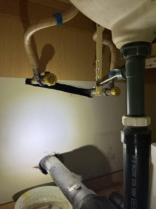 Responded to service call for bathroom faucet issues. Upon inspection, found vanity stop valves leaking, drain stem leaking, and failing hot side cartridge. Completed full repair by replacing shut-off valves, drain stem, and supply lines, restoring proper function to the bathroom fixture.