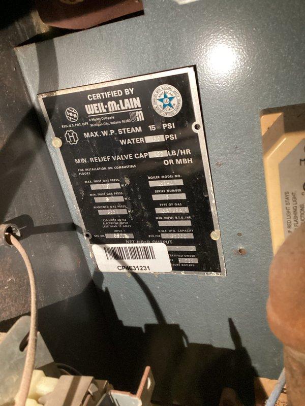Responded to service call for a Weil-McLain boiler system where the second floor zone was overheating and would not shut off except via breaker. Diagnostic inspection revealed a stuck zone valve for the second floor. Manually closed the valve by removing the motor head and depressing the spring mechanism. Disconnected wiring to prevent reopening. First floor heating remains operational while second floor heating is currently disabled until replacement zone valve motor can be installed. Customer signature obtained for future zone valve head replacement.