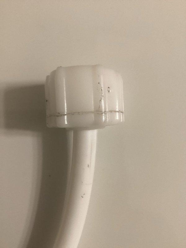 Responded to emergency call for toilet valve malfunction that caused significant water leakage. Identified broken nut at bottom of toilet tank as the source of the leak. Replaced water supply line in main bathroom and installed a second preventative water line replacement on adjacent toilet at customer request to prevent future incidents.