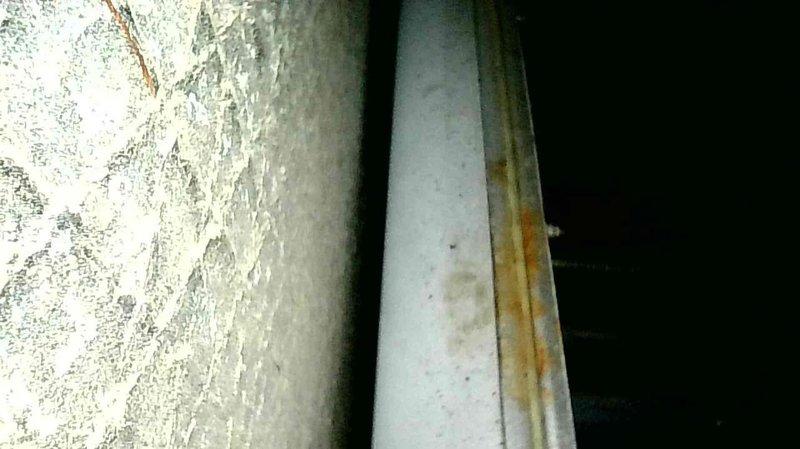 Responded to a no heat emergency for a 20-year-old Amana LP furnace that was blowing cold air and running constantly. Discovered tripped rollout switch. Performed thorough inspection of heat exchanger but could not definitively locate compromise despite checking through blower access and top of unit. CO readings measured at 120 ppm on exhaust with visible black residue on vent pipe. Due to age and safety concerns, recommended immediate discontinuation of furnace operation and provided temporary electric heating while scheduling follow-up for replacement options.