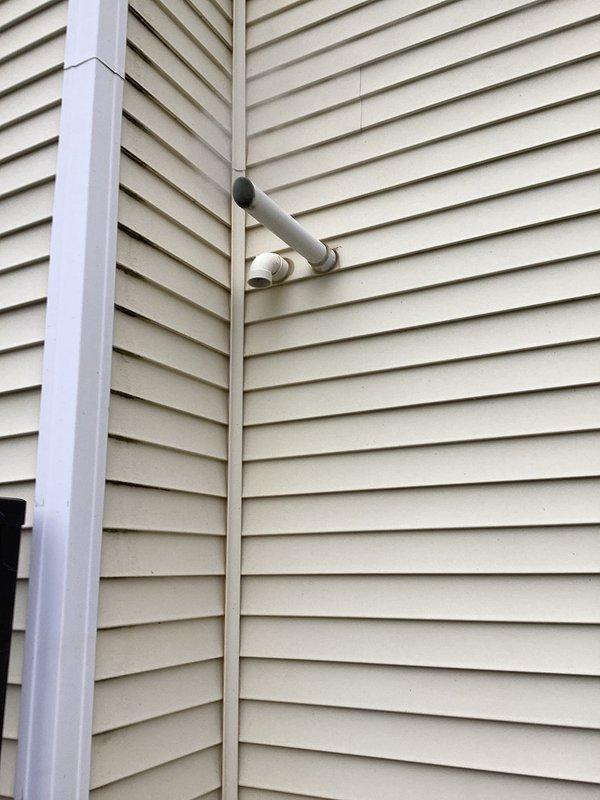 Responded to a no heat emergency for a 20-year-old Amana LP furnace that was blowing cold air and running constantly. Discovered tripped rollout switch. Performed thorough inspection of heat exchanger but could not definitively locate compromise despite checking through blower access and top of unit. CO readings measured at 120 ppm on exhaust with visible black residue on vent pipe. Due to age and safety concerns, recommended immediate discontinuation of furnace operation and provided temporary electric heating while scheduling follow-up for replacement options.