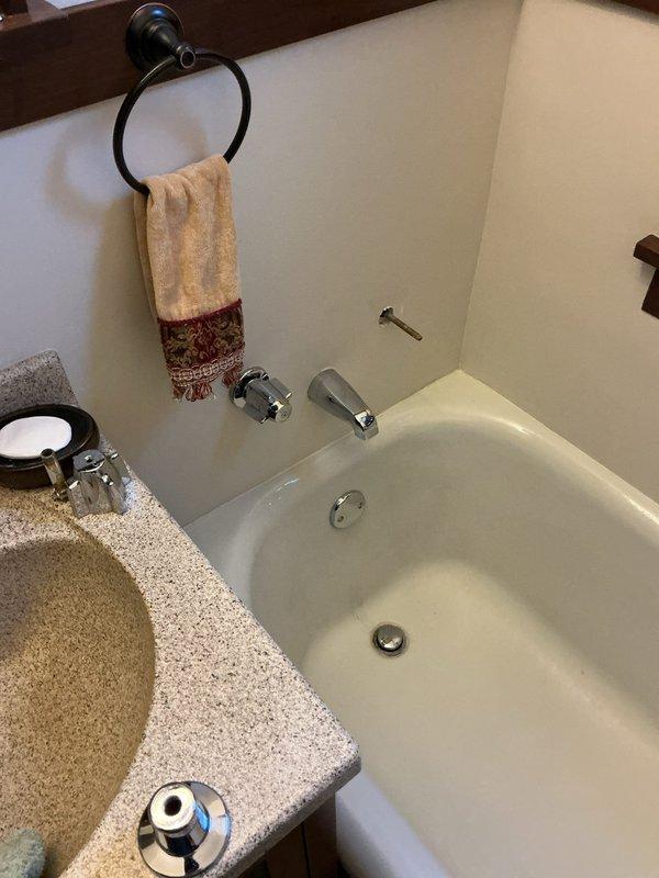 Responded to callback regarding persistent shower leak. Upon inspection, identified defective shower valve as source of the problem. Removed and replaced shower valve assembly to resolve the leak.