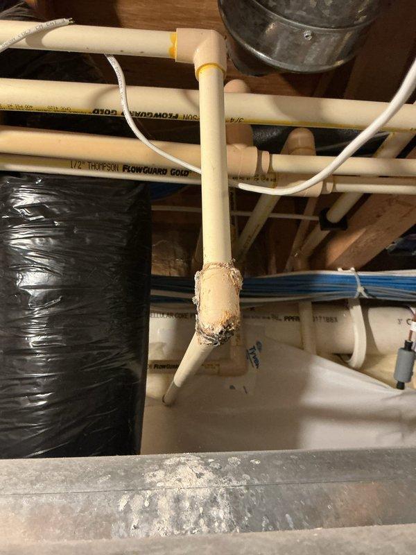Responded to service call for a leaking 50-gallon natural gas water heater (2016 model) exhibiting Fault Code 2 issues. Diagnosed failed pressure relief valve causing T&P discharge and damaged CPVC connections. Replaced faulty pressure valve and repaired compromised CPVC piping sections, restoring proper system operation and eliminating leakage.