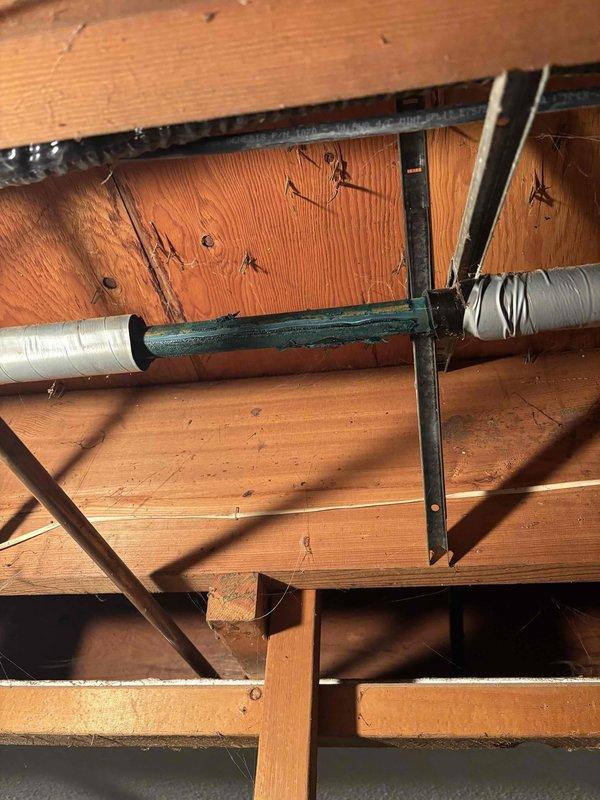 Diagnosed and resolved outdoor spigot control issue by locating and installing a new shutoff valve for front hose bib. Installed copper piping with brass fittings and a yellow handle shutoff valve, properly secured to joists with metal brackets for optimal accessibility and function.