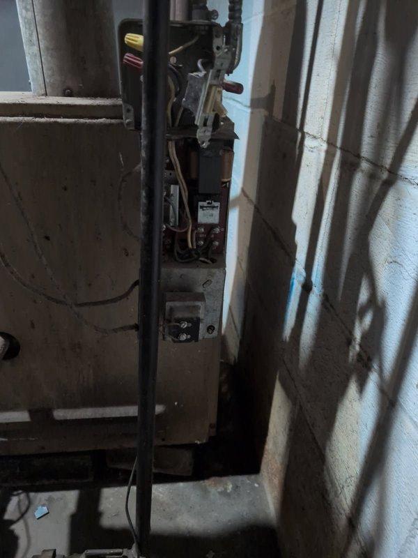 Diagnosed no heat issue on 60-year-old Ward 700 gas boiler system. Found failed aquastat relay with chattering contactor preventing proper operation. Verified control transformer power supply was functional. Prepared recommendation for comprehensive system upgrade including aquastat replacement, thermostat installation, and complete rewiring to restore safe operation.