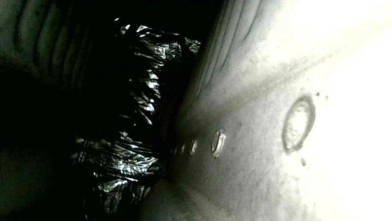 Responded to no heat call for 20-year-old Bryant natural gas furnace exhibiting short cycling and error code 13. Inspection revealed a suspected cracked heat exchanger, confirmed through visual assessment of the interior components. Reset system temporarily restored operation, but recommended replacement due to age and safety concerns.