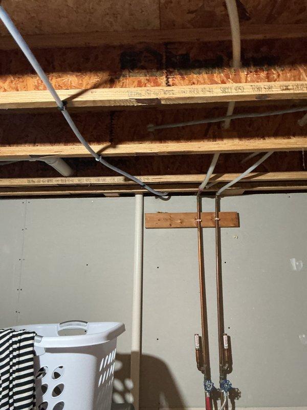 Successfully installed customer-supplied garbage disposal, ran refrigerator water line for ice maker, and replaced outdoor spigot (had to cut hose as it could not be detached). Secured all connections and verified proper operation.