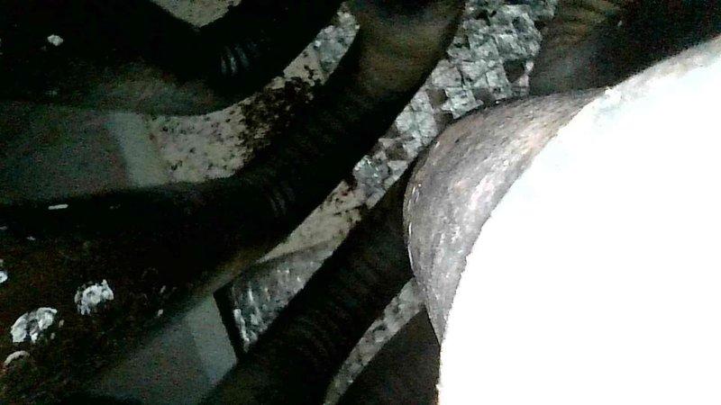 Responded to no-heat service call for 20+ year old forced air furnace that was only producing clicking sounds. Diagnostic inspection revealed failed inducer motor. Due to equipment age and component failure, recommended and completed replacement of entire unit rather than repairing the obsolete system.