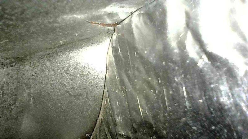 Performed 8-12 year furnace tuneup on 20+ year old LP Trane system. Inspection revealed severely compromised heat exchanger with multiple cracks and holes. Documented damage with photos showing structural failure of heat exchanger. Arranged for sales advisor to visit same day to discuss replacement options.