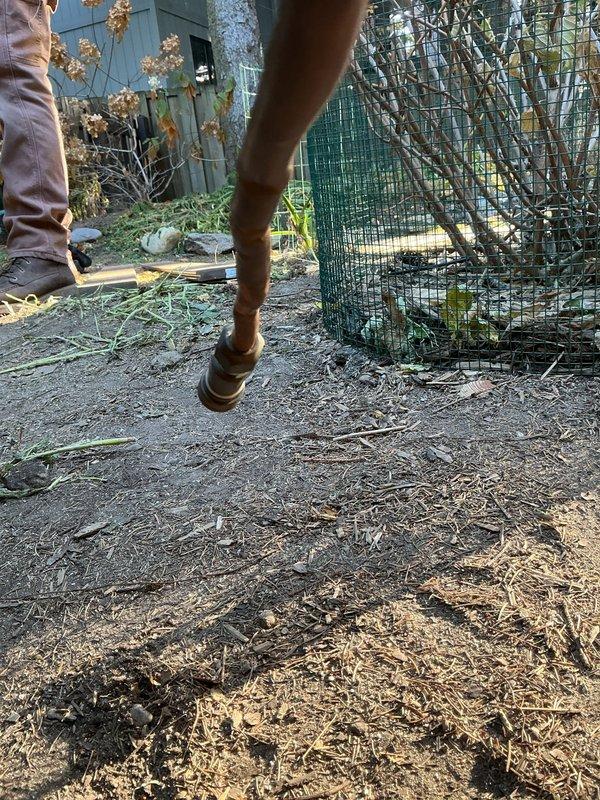 Responded to service call for damaged gas line running from house to outdoor grill. Upon inspection, found the gas line had been kinked and burred during deck construction. Accessed the confined space between wooden framing to examine the damage, then successfully completed gas line repair to restore safe operation.