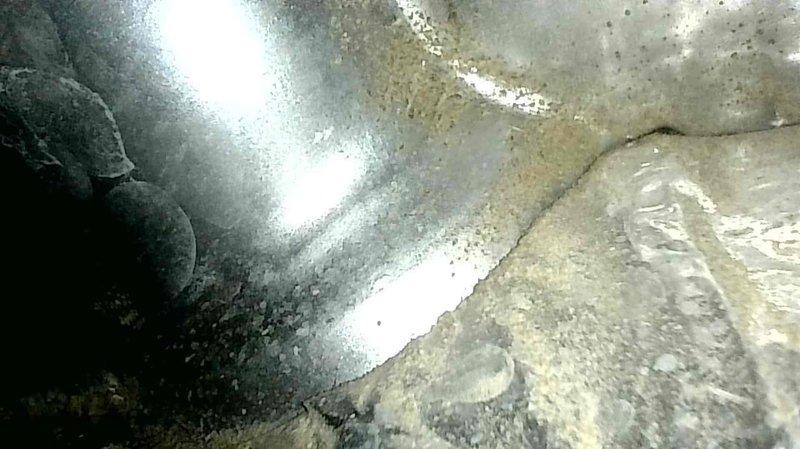 Responded to service call for 20-year-old furnace not producing heat. Diagnostic testing revealed error codes 14 and 34. Upon inspection, found failed hot surface igniter, cracked collector box with visible leakage, and deteriorating inducer motor. Due to unit's age and multiple component failures, recommended system replacement rather than repair.