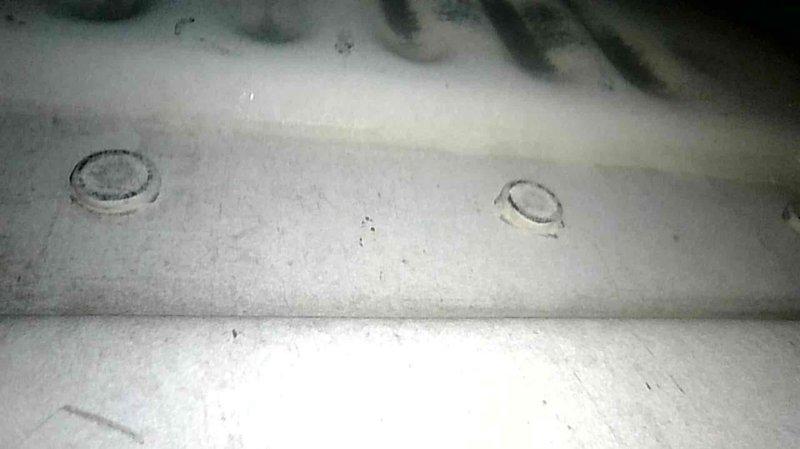 Responded to service call for 20-year-old furnace not producing heat. Diagnostic testing revealed error codes 14 and 34. Upon inspection, found failed hot surface igniter, cracked collector box with visible leakage, and deteriorating inducer motor. Due to unit's age and multiple component failures, recommended system replacement rather than repair.