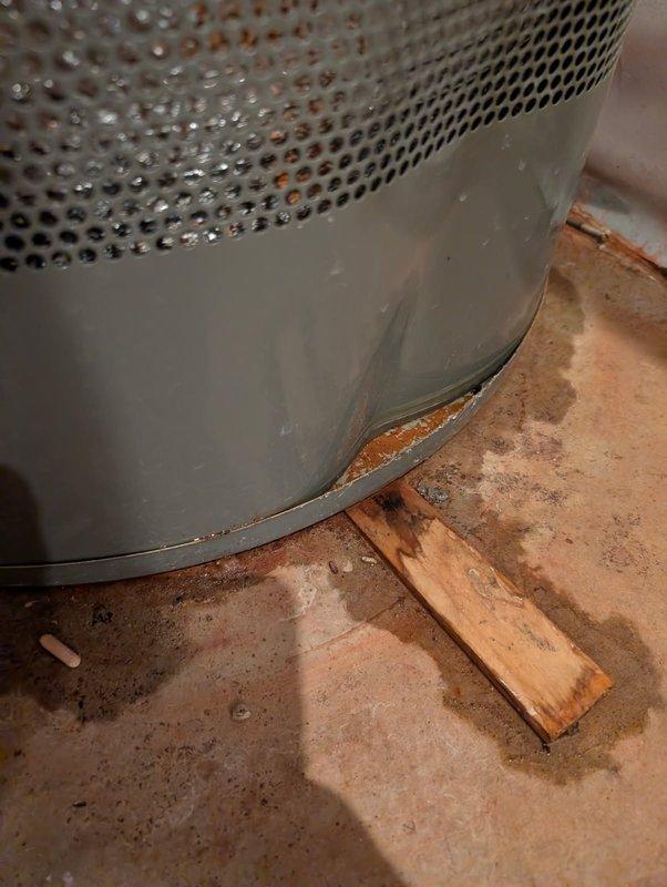 Diagnosed and repaired a leaking water softener system installed in 2017. Upon inspection, found water damage at base of unit and identified the drain connection to tank as the source of leakage. Replaced the damaged plastic drain assembly which had significant mineral buildup and sealed the connection properly to resolve the issue.