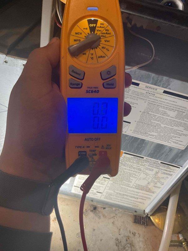 Responded to no heat call for natural gas system under 10 years old. Diagnostic testing with multimeter identified induction motor failure. System was blowing cold air and not firing. Replaced faulty component and restored proper heating function.