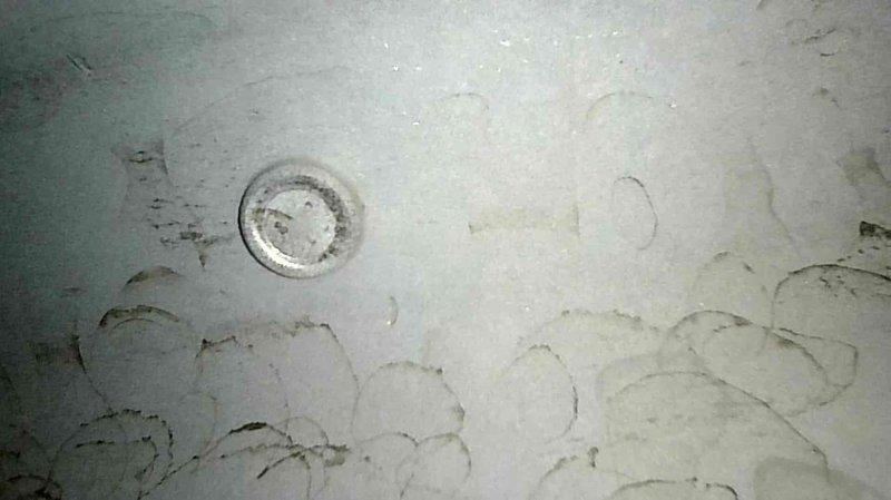 Responded to no heat call for natural gas system under 10 years old. Diagnostic testing with multimeter identified induction motor failure. System was blowing cold air and not firing. Replaced faulty component and restored proper heating function.