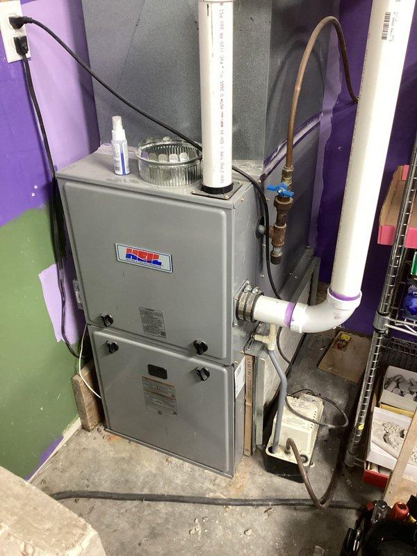 Completed annual preventative maintenance on 1-year-old LP furnace. Performed full system inspection including flame sensor cleaning, condensate drain verification, gas pressure adjustment (corrected from low reading), and electrical component check. System is operating correctly with proper 55° temperature rise and clean air filter. Unit is in excellent condition with no operational issues noted.