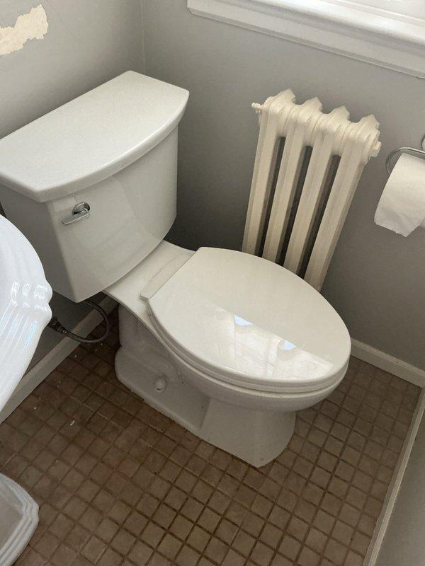 Successfully removed toilet to accommodate radiator installation, inspected flange and waste pipe for any damage, then reinstalled toilet with new wax ring and supply line. Tested for proper operation and water-tightness after reinstallation, ensuring no leaks at the base or supply connections.