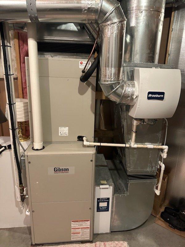 Performed comprehensive furnace tune-up on Gibson system, including inspection of heat exchanger (camera-verified), burners, blower, inducer, pressure switches, safety/limit switches, flame sensor, and igniter. Verified proper venting and exhaust flue operation, checked gas pressures and combustion air, and cycled system on both high/low settings. System functioning normally. Customer requested estimate for boiler service and domestic side flush for in-floor heating system.
