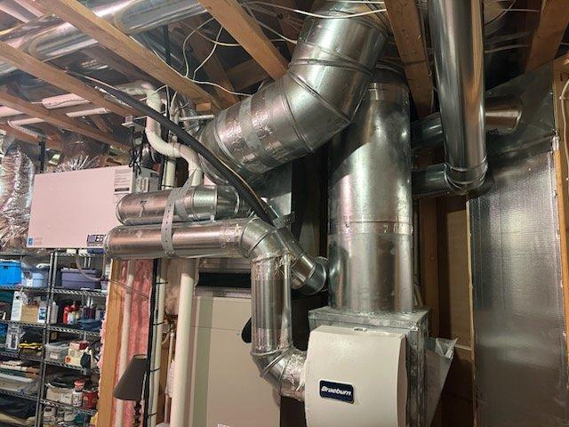 Performed comprehensive furnace tune-up on Gibson system, including inspection of heat exchanger (camera-verified), burners, blower, inducer, pressure switches, safety/limit switches, flame sensor, and igniter. Verified proper venting and exhaust flue operation, checked gas pressures and combustion air, and cycled system on both high/low settings. System functioning normally. Customer requested estimate for boiler service and domestic side flush for in-floor heating system.