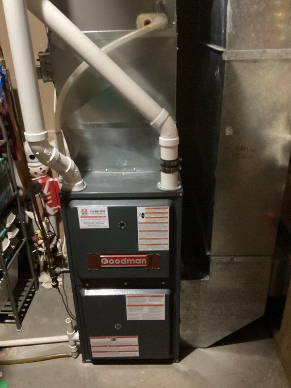 Performed routine furnace tune-up on Goodman system. Replaced dirty filter, cleaned and balanced blower, cleared condensate trap and routine lines. Inspected heat exchanger showing normal wear on first back bends without compromises. Noted inducer motor drawing higher than specified amperage (3A vs 2A rated). System maintained proper gas pressures with 60-degree temperature rise during 15-minute operational test. Discussed with customer regarding heat exchanger condition and inducer motor, provided requested estimates for these components.