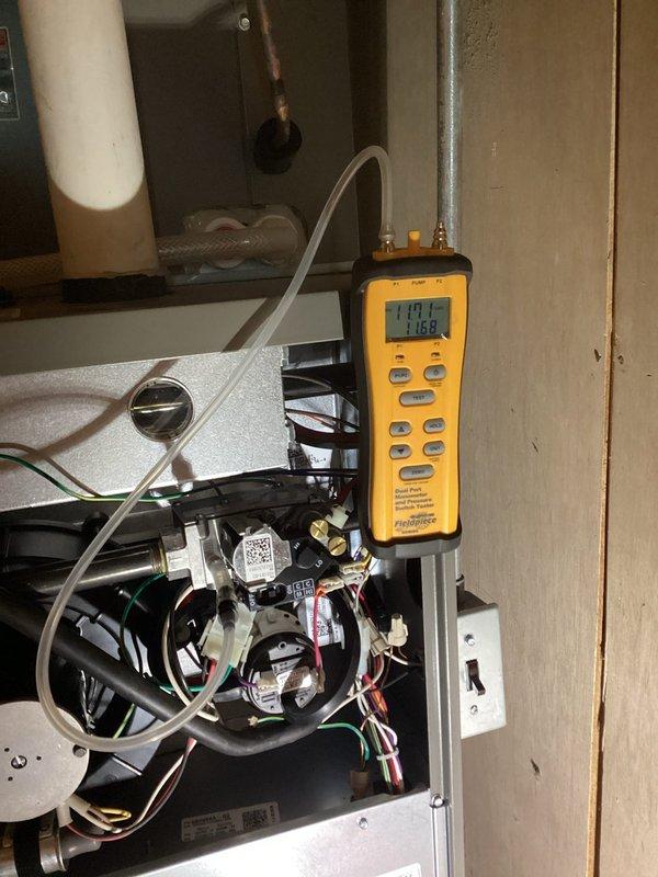 Performed comprehensive furnace tune-up on 2-year-old natural gas system. Inspected and verified all components in good working condition including clean heat exchanger, properly balanced blower, and electrical components within specifications. System demonstrated proper operation with appropriate gas pressure and 50-degree temperature rise during 15-minute test cycle. Filter noted as beginning to accumulate dirt; all other systems functioning normally.