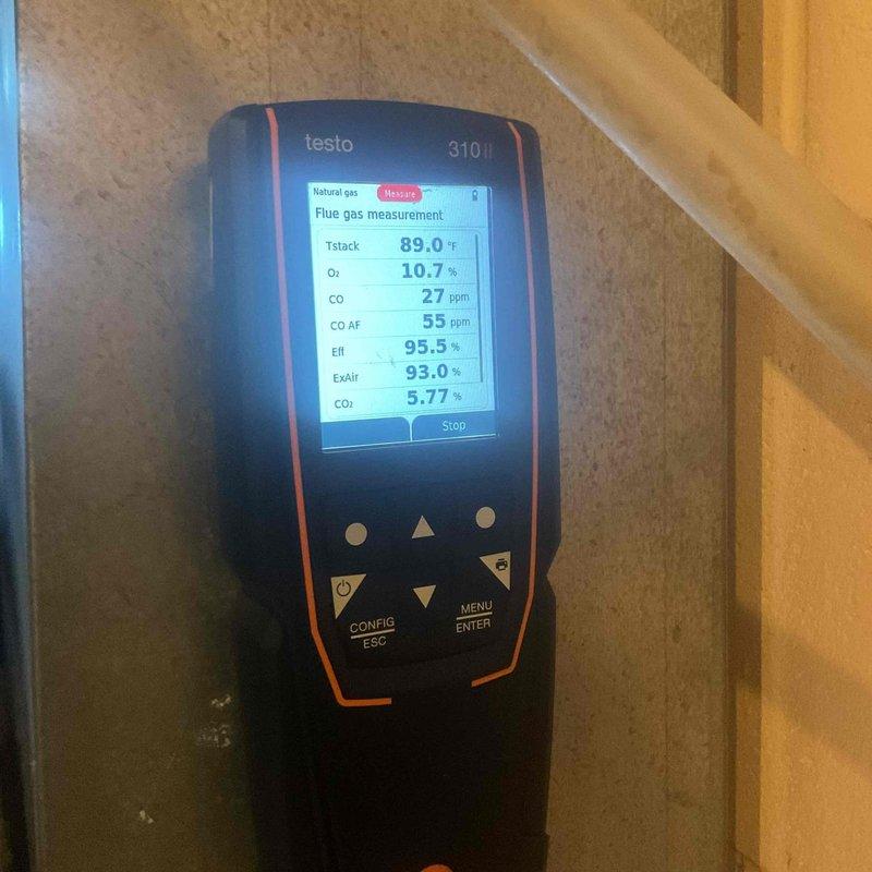 Performed 8-12 furnace tune-up on 5-year-old unit. Completed electrical system testing with digital multimeter and conducted flue gas analysis using Testo 310, which showed normal combustion parameters (CO: 27ppm, Efficiency: 95.5%, CO₂: 5.77%). Identified cracked heat exchanger during inspection, recommended full replacement due to safety concerns.