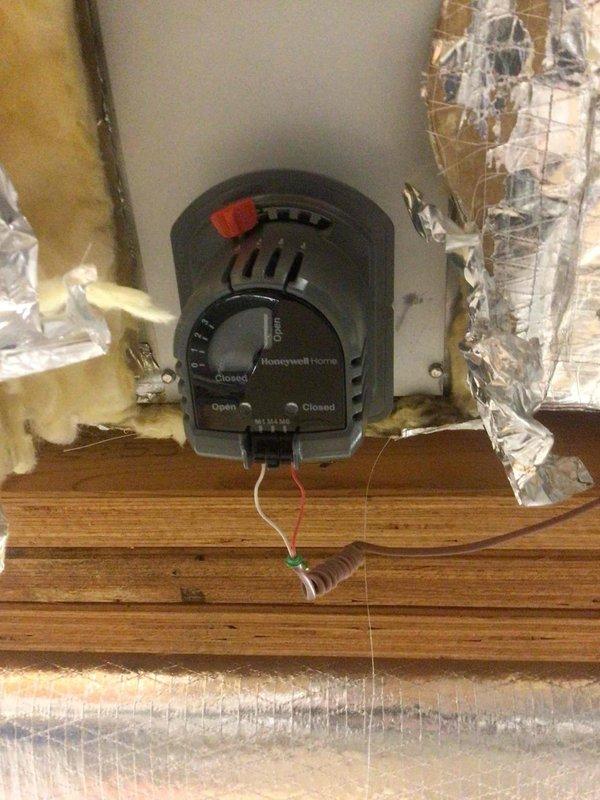 Replaced faulty zone damper assembly as requested on previous service call. Installed new Honeywell damper actuator, properly mounting it to the existing ductwork. Verified complete system operation after installation with successful testing confirming proper damper functionality.