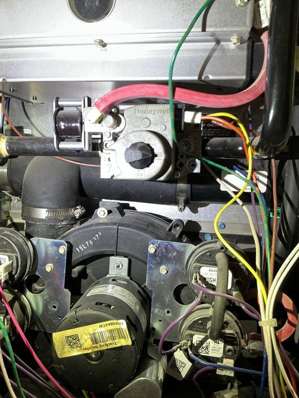 Performed routine maintenance tune-up on 20-year-old Lennox high-efficiency furnace. Inspected heat exchanger (good condition) and verified proper combustion. Identified corrosion on condensation trap indicating possible crack requiring replacement. System currently functioning correctly but recommended condensation trap replacement and consultation with comfort advisor for long-term reliability.