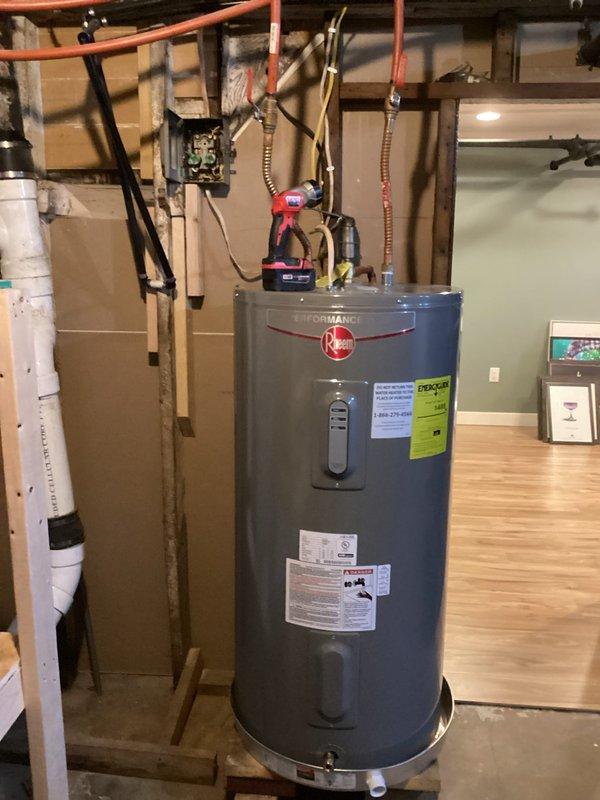 Performed comprehensive inspection of 20-year-old Rheem Performance water heater and associated plumbing system. Evaluated three outdoor spigots requiring replacement. Documented current installation conditions including supply lines, drainage configuration, and connection points. Provided customer with detailed replacement options and repair estimates for multiple plumbing projects as requested.