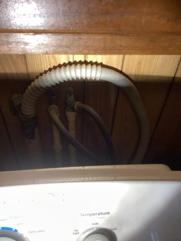 Performed comprehensive inspection of 20-year-old Rheem Performance water heater and associated plumbing system. Evaluated three outdoor spigots requiring replacement. Documented current installation conditions including supply lines, drainage configuration, and connection points. Provided customer with detailed replacement options and repair estimates for multiple plumbing projects as requested.